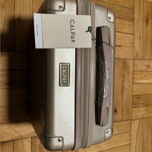 Calpak Silver and Tan Travel Bag